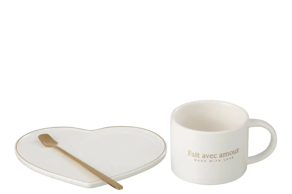 Mugs en porcelaine avec soucoupe et cuillère dorée